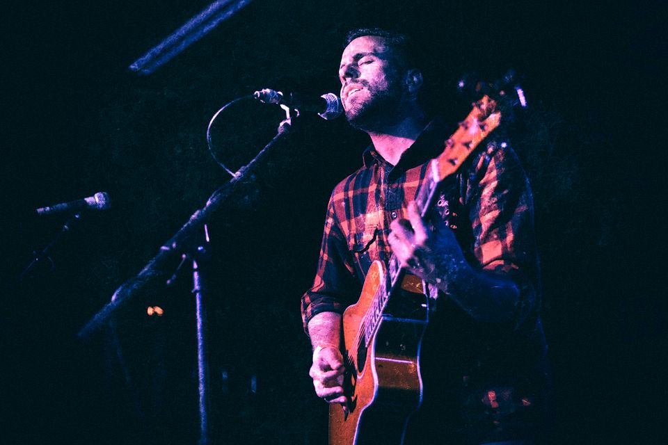 Mike Llerena performs on stage