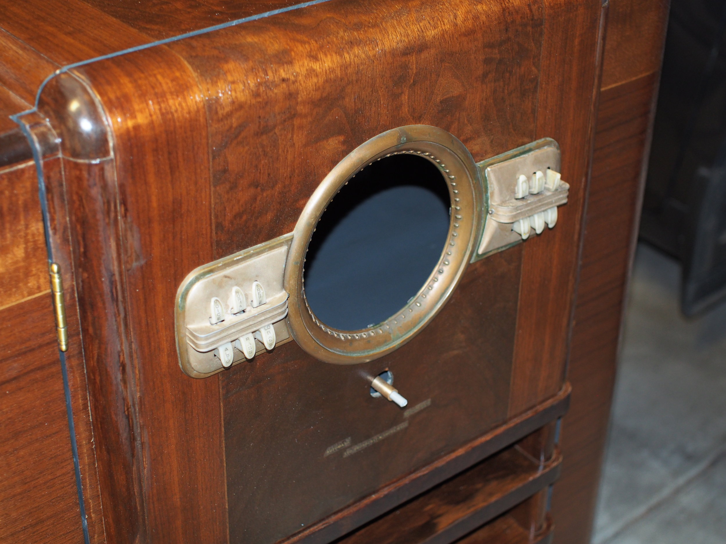 The brass bushing on the long-shaft potentiometer, which is mounted on the panel