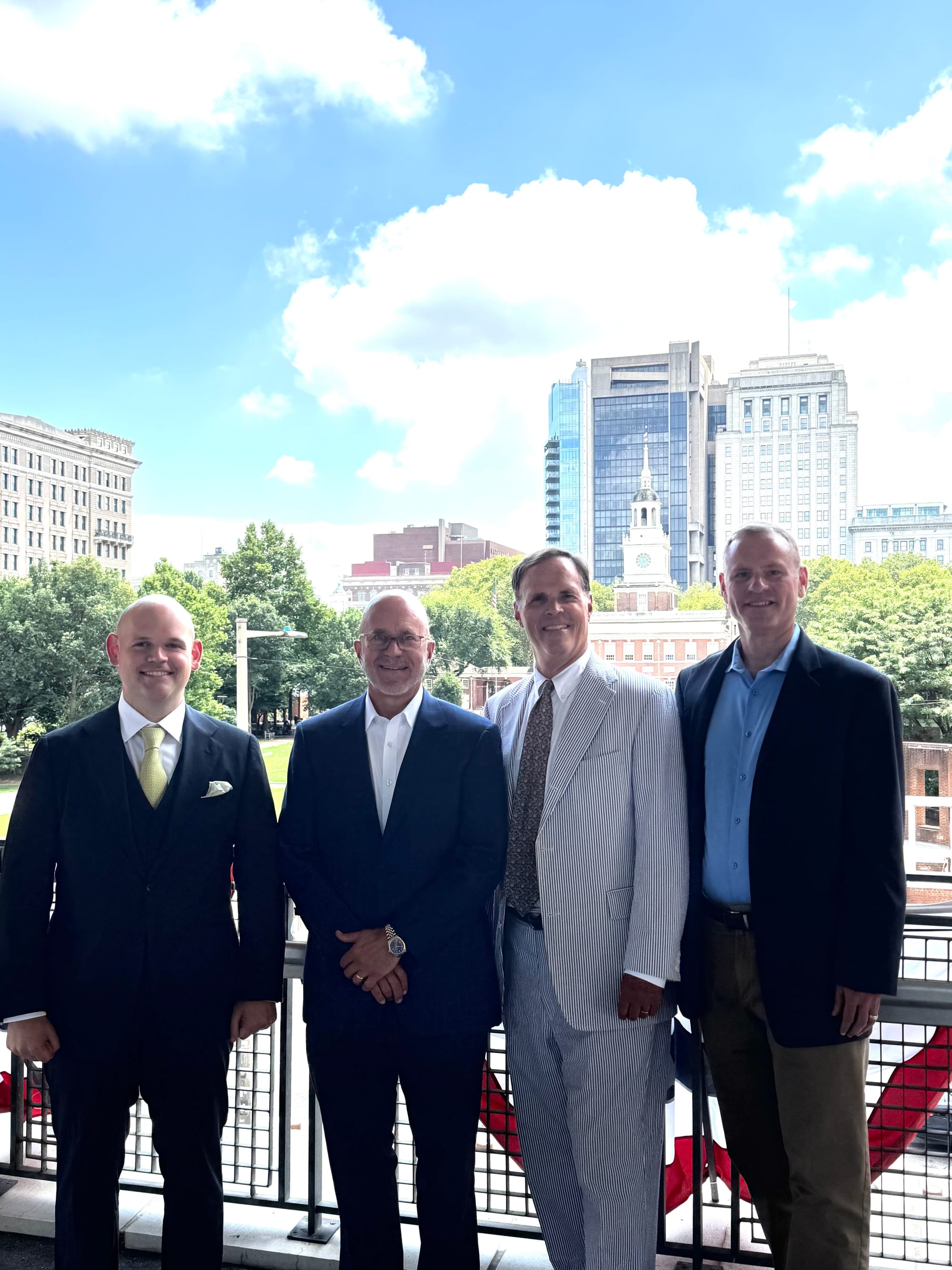 Picture of people involved in lawsuit at a press conference.