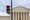 Stop sign outside Supreme Court building. Supreme Court strikes down coordinated spending caps on parties.