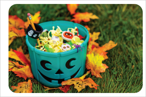 Teal pumpkin pail with non-food Halloween treats
