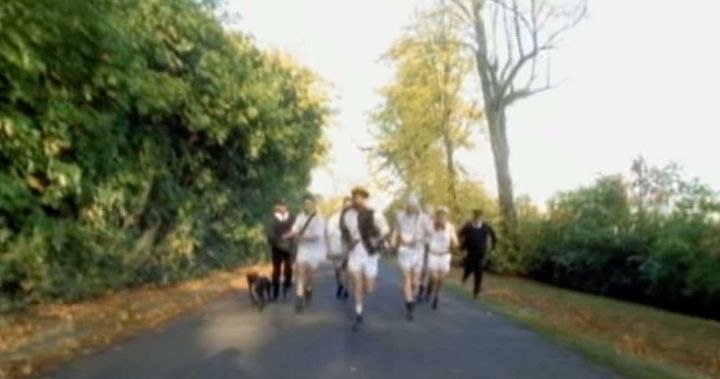 Group running down a street