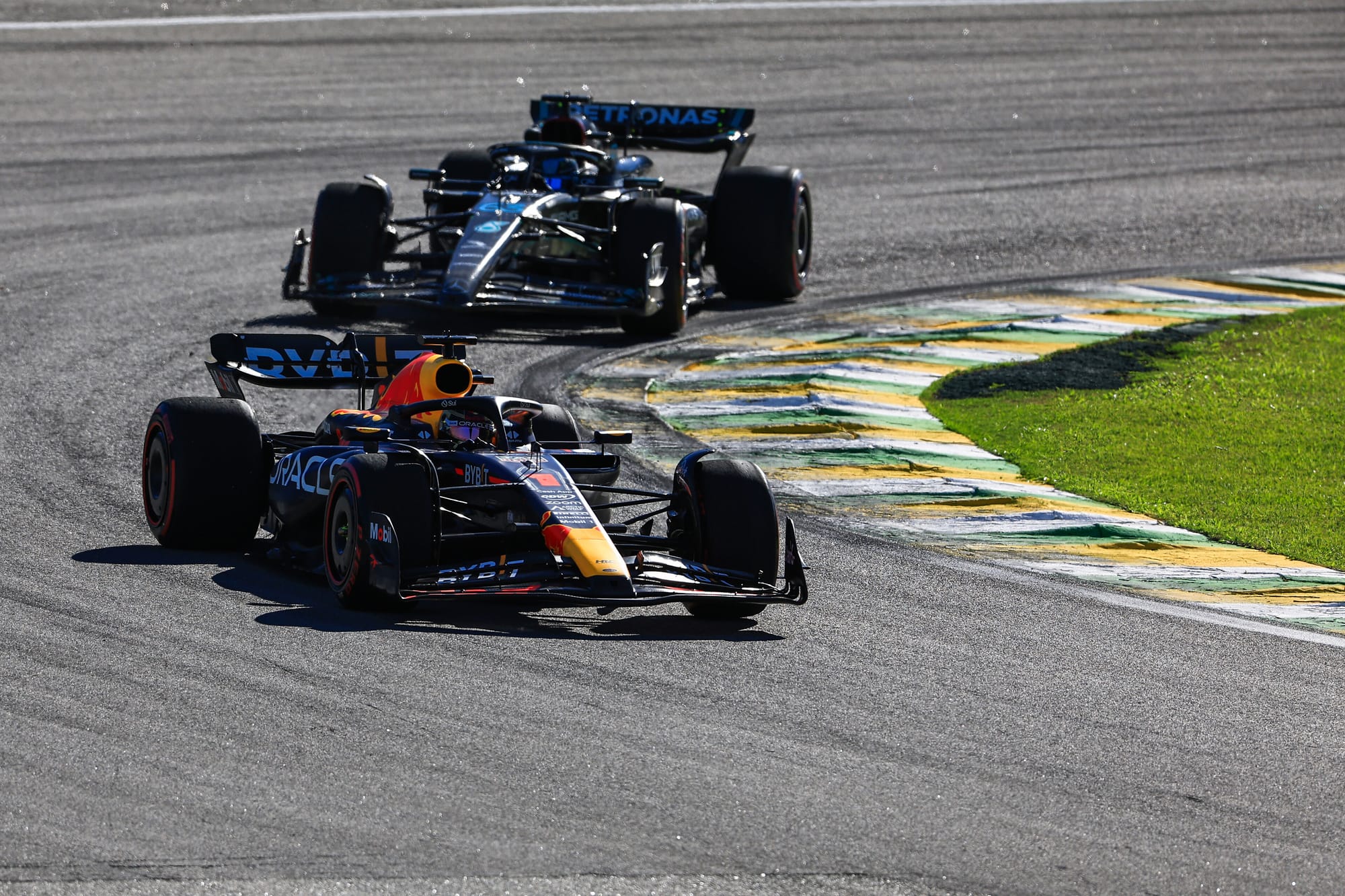 Max Verstappen, Red Bull, and George Russell, Mercedes, F1