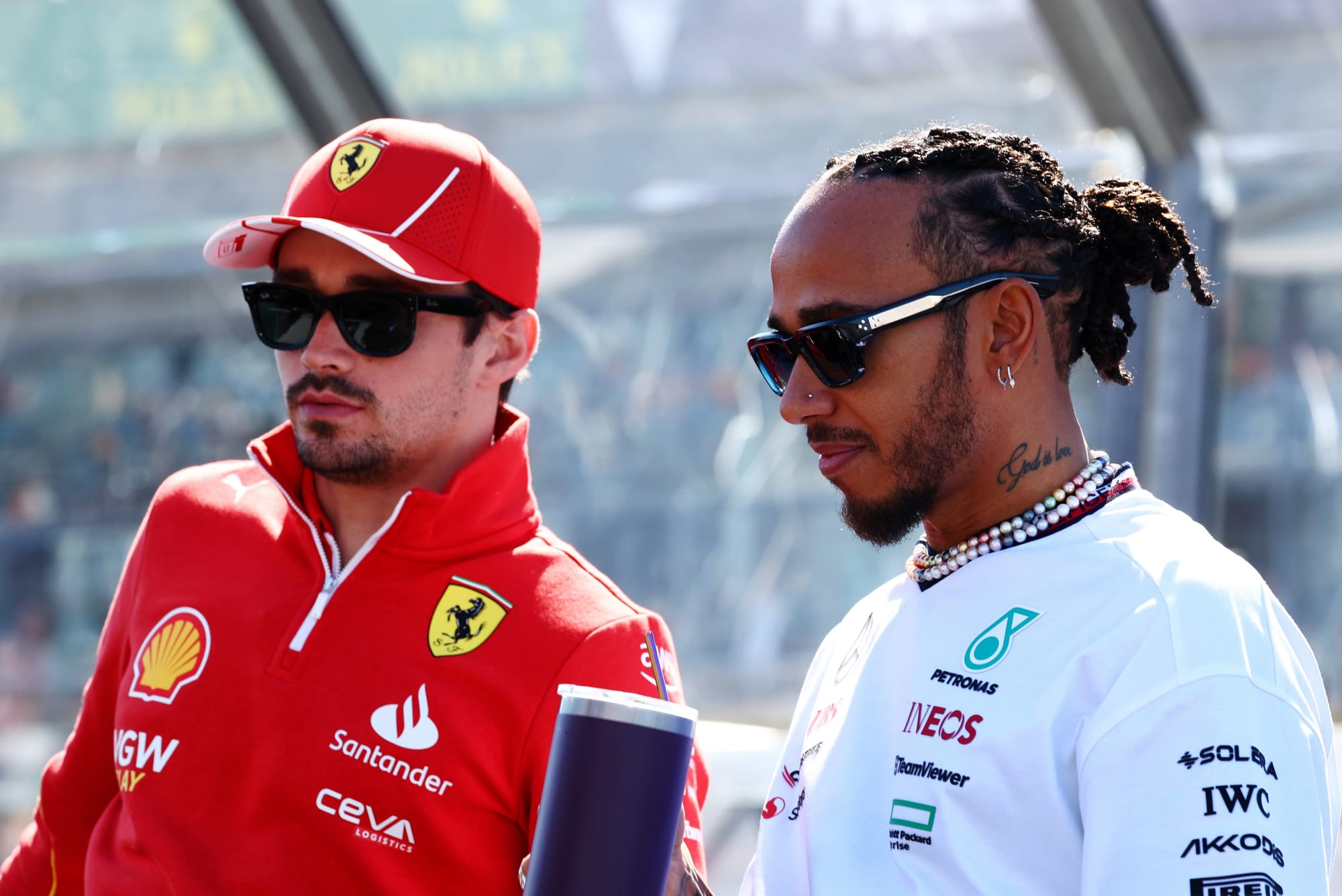 Charles Leclerc, Ferrari, and Lewis Hamilton, Mercedes, F1