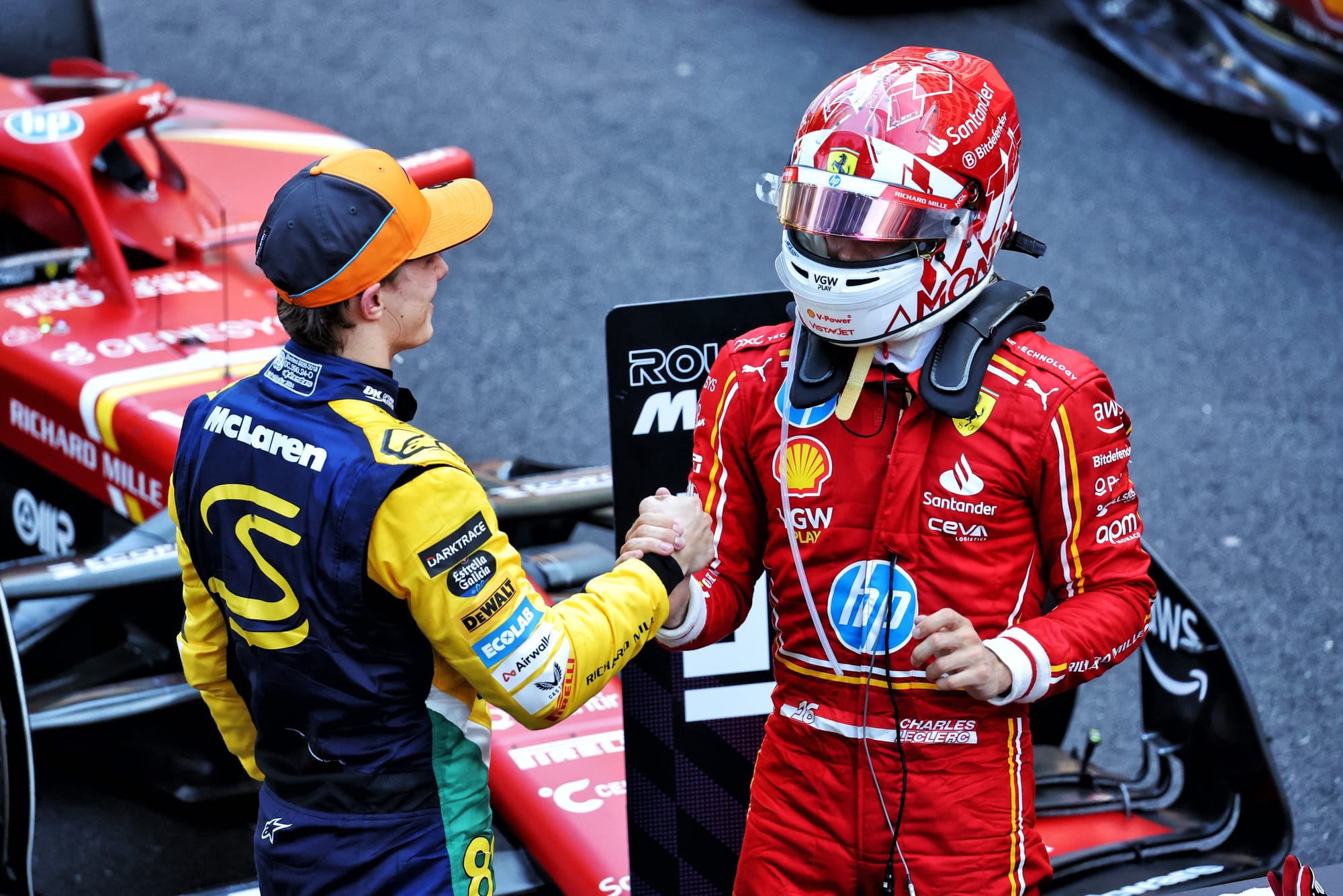Oscar Piastri, McLaren, and Charles Leclerc, Ferrari, F1
