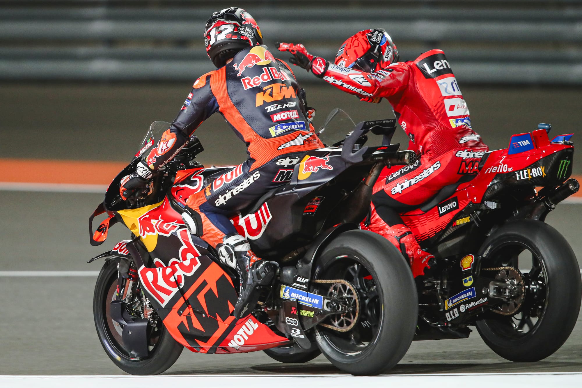 Maverick Vinales KTM and Marc Marquez Ducati Qatar MotoGP 2025