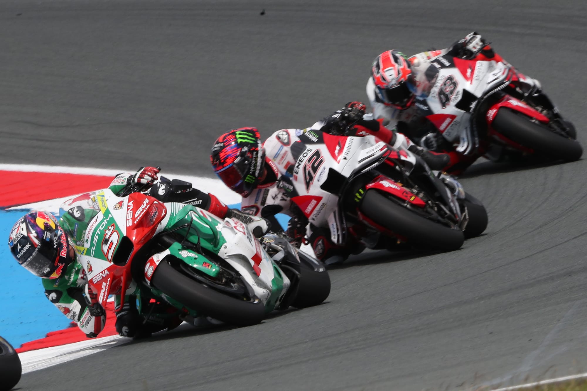 Johann Zarco leads Alex Rins and Jack Miller, Assen MotoGP 2025