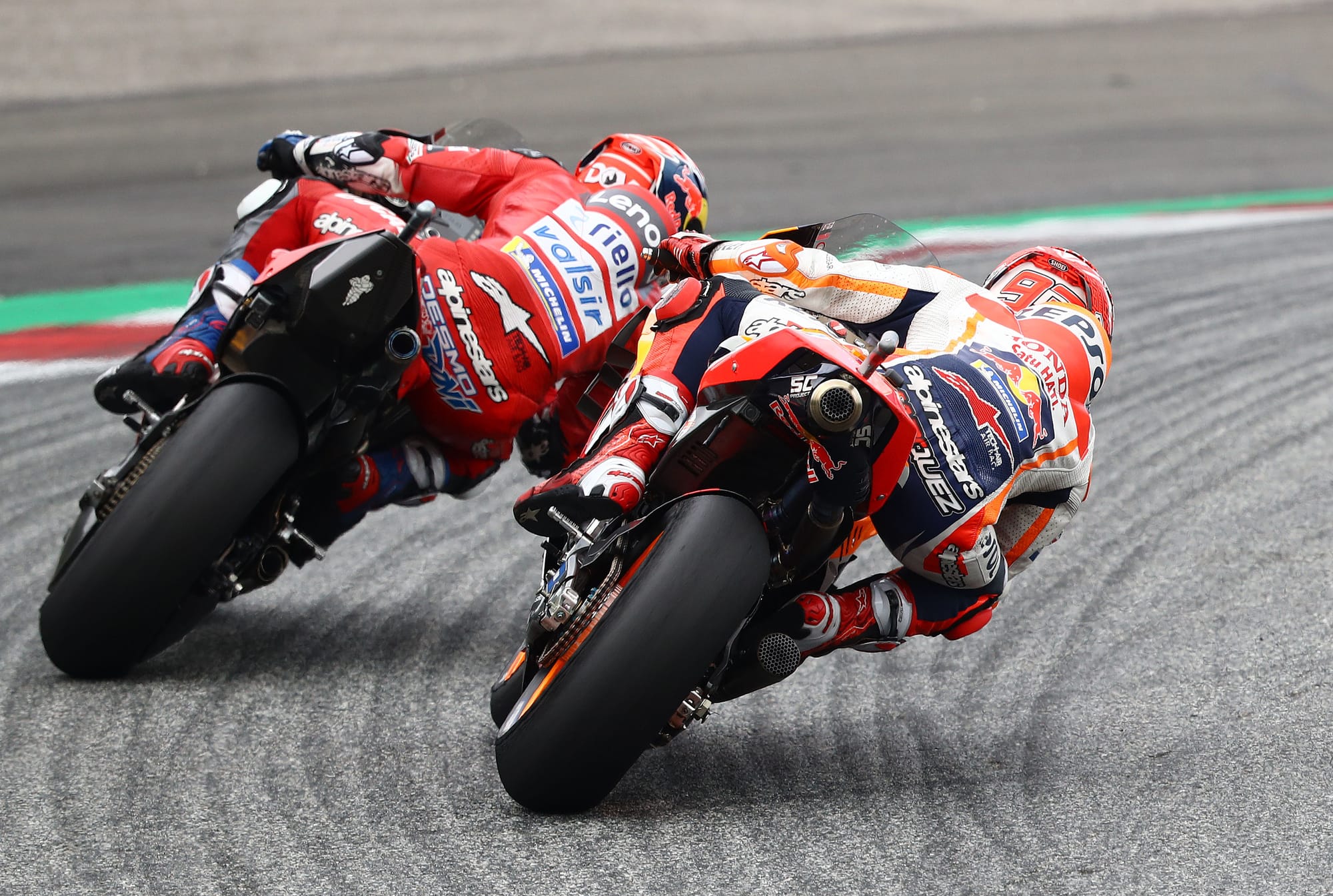 Andrea Dovizioso, Ducati, races Marc Marquez, Honda, at MotoGP's 2019 Austrian Grand Prix