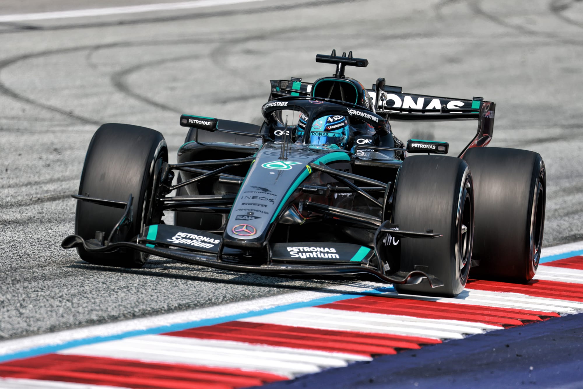Russell resists Verstappen for first victory since season opener