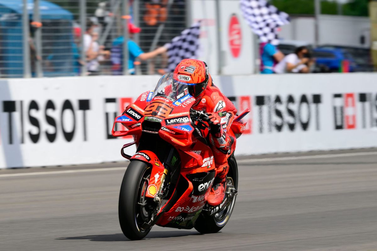 Marquez survives penalty scare to win bizarre Brno sprint
