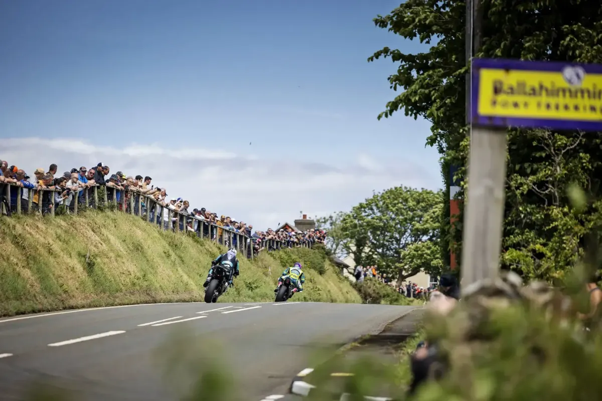 Riders in front of crowds at the Isle of Man TT