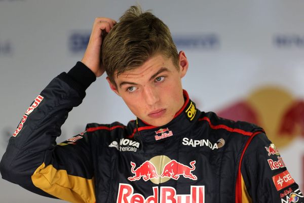 Max Verstappen scratching his head during his rookie F1 season with Toro Rosso in 2015