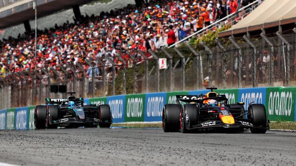 Max Verstappen (R) leading George Russell (L) in the 2025 Spanish GP