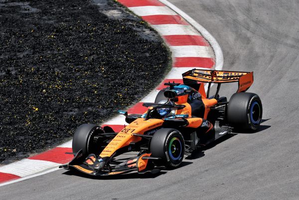 Gary Anderson on the front wing McLaren had to remove