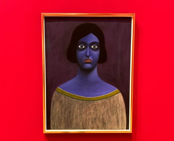 Painting of a blue-skinned woman with a dour expression on a bright wall