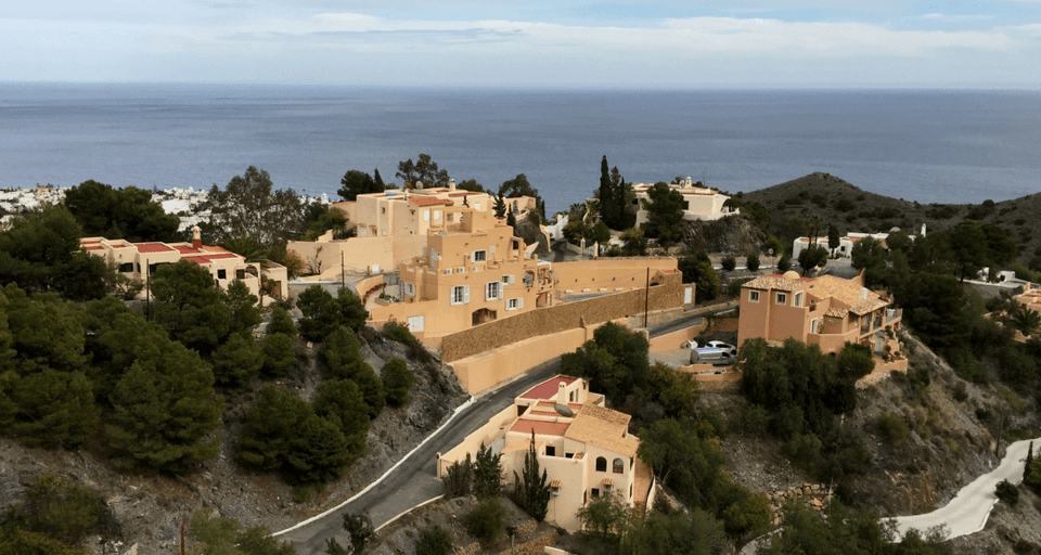 Pastel houses with ocean in background - Moral Letters to Lucilius