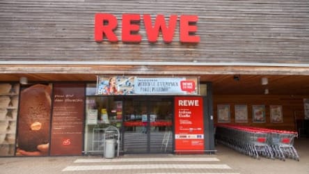Facade of a Rewe grocery store in Germany