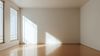 Empty room with large windows