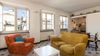 Living room with windows and furniture in an apartment