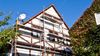 House with scaffolding, undergoing renovation