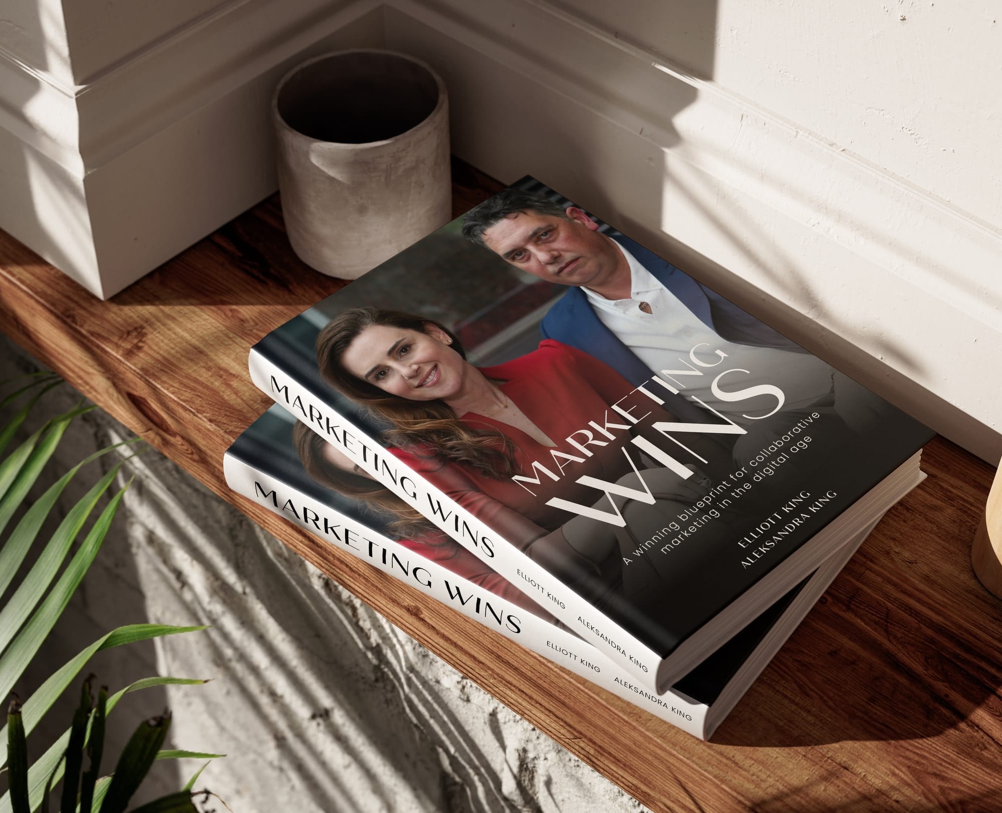 Marketing Wins book cover mockup, the marketing fundamentals book by Elliott King and Aleksandra King
