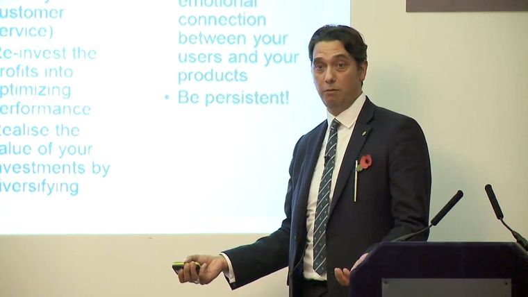 Elliott King delivering his talk on the history of digital business at the Institute of Directors in London