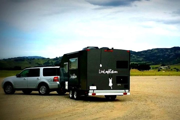 What's the best way to break the ice and talk to people when traveling?