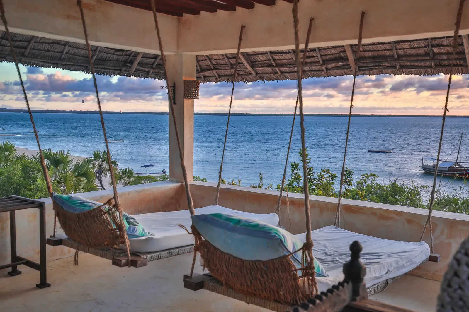 Swahili-style banda built from palm thatch, coconut poles and coral stone at The Cabanas Lamu, Kenya