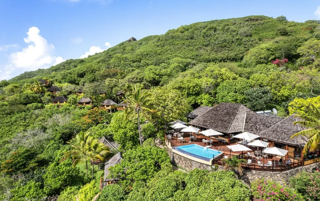 Le Nuku Hiva's hillside pool and open-air restaurant overlooking Taiohae Bay on Nuku Hiva