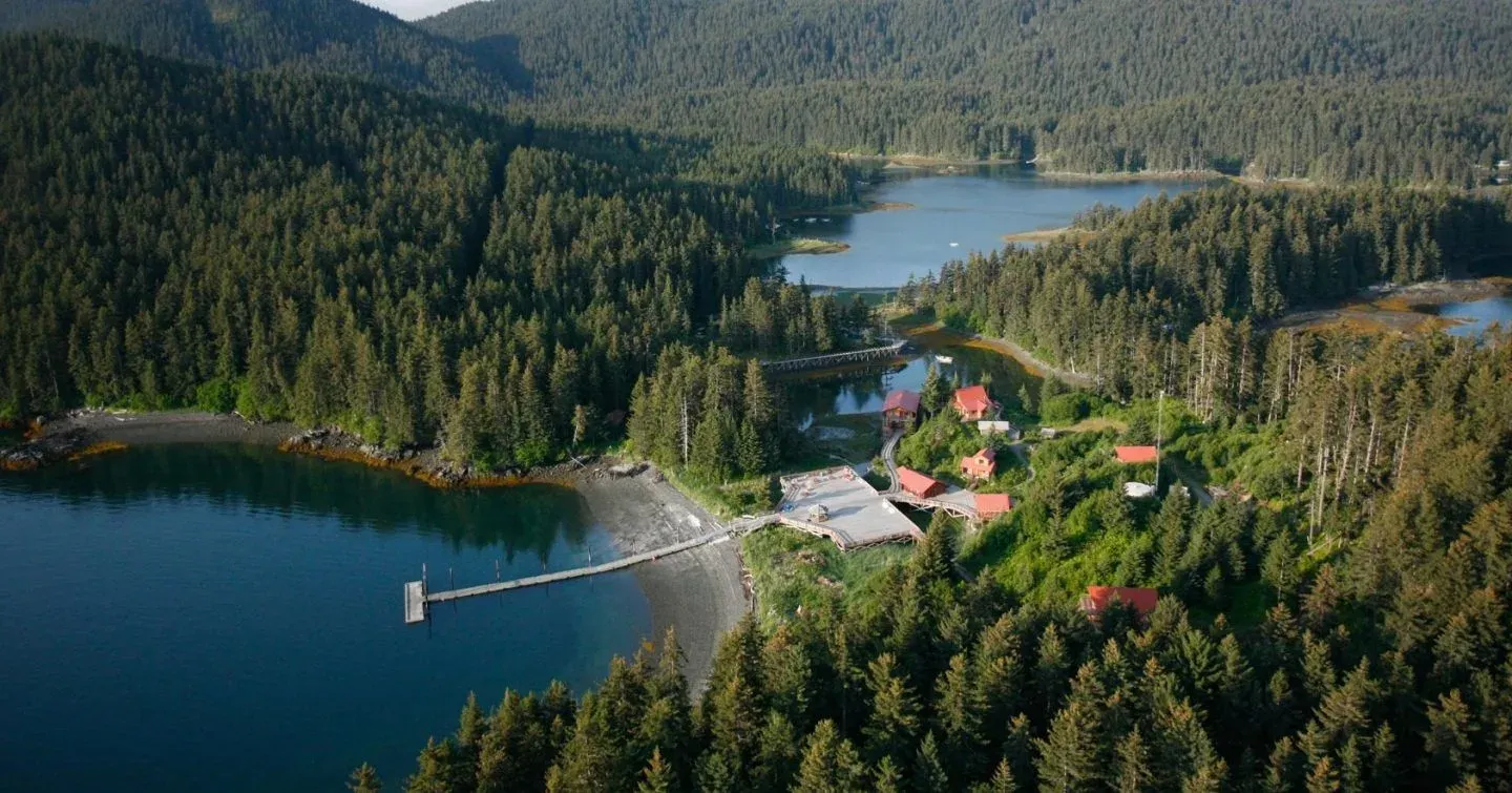 Aerial view of off-grid Tutka Bay Lodge in a cove off Kachemak Bay, Alaska