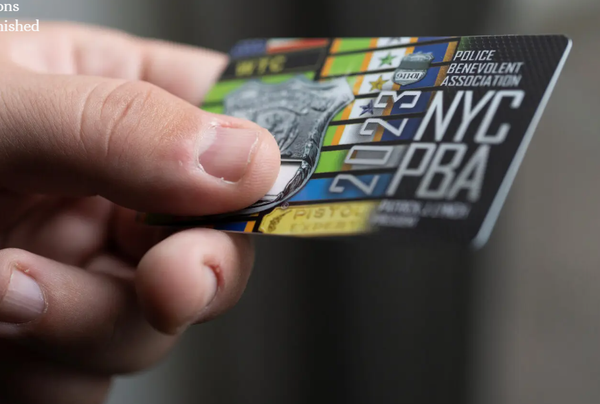 NYC cops give "get out of a ticket free" cards to friends