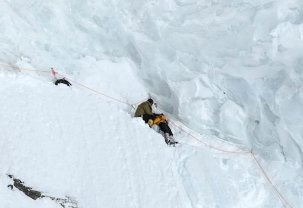 Dozens of climbers walked past a man who was dying on K2