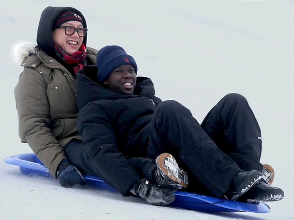 His Uber driver had never been tobogganing so he took him