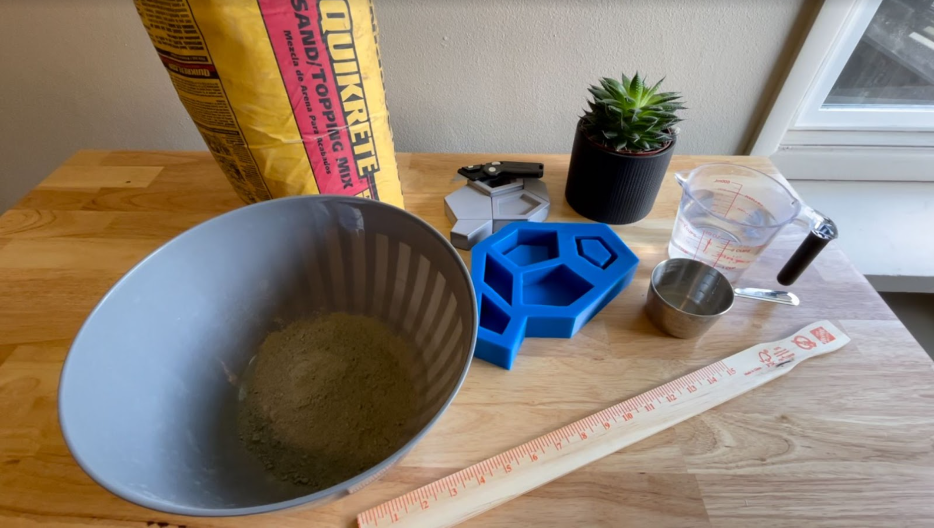 Concrete mixing process, just before adding water and stirring the mixture.