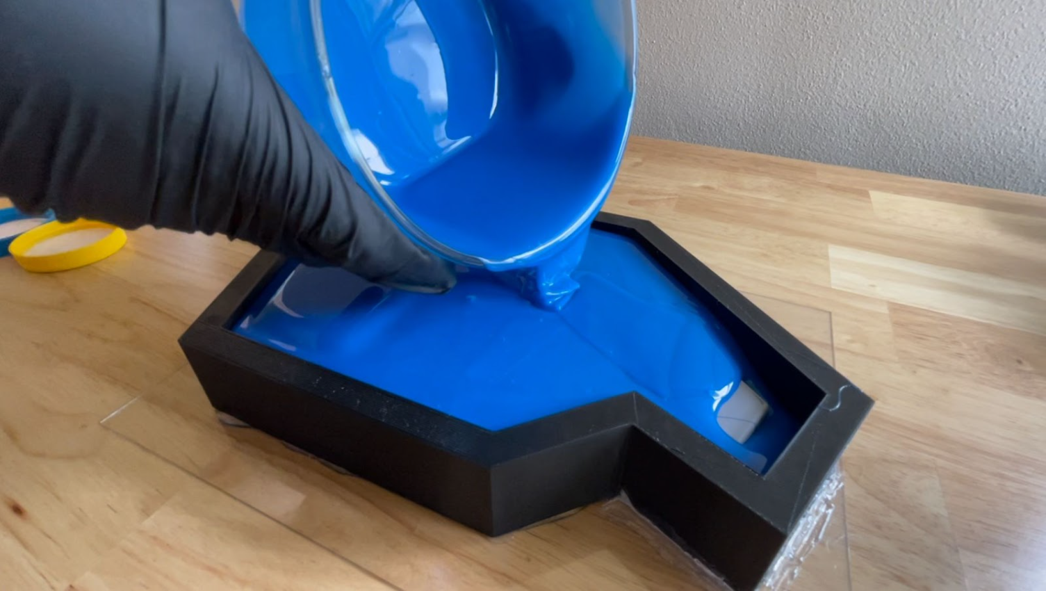 Filling the mold shell with Mold Star 30 silicone.