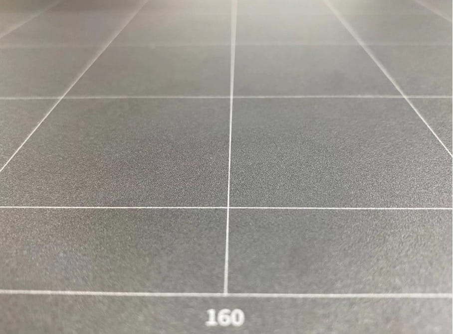 A close-up picture of the sticker of the print sheet, showing its improved adhesion effect of the initial layer.