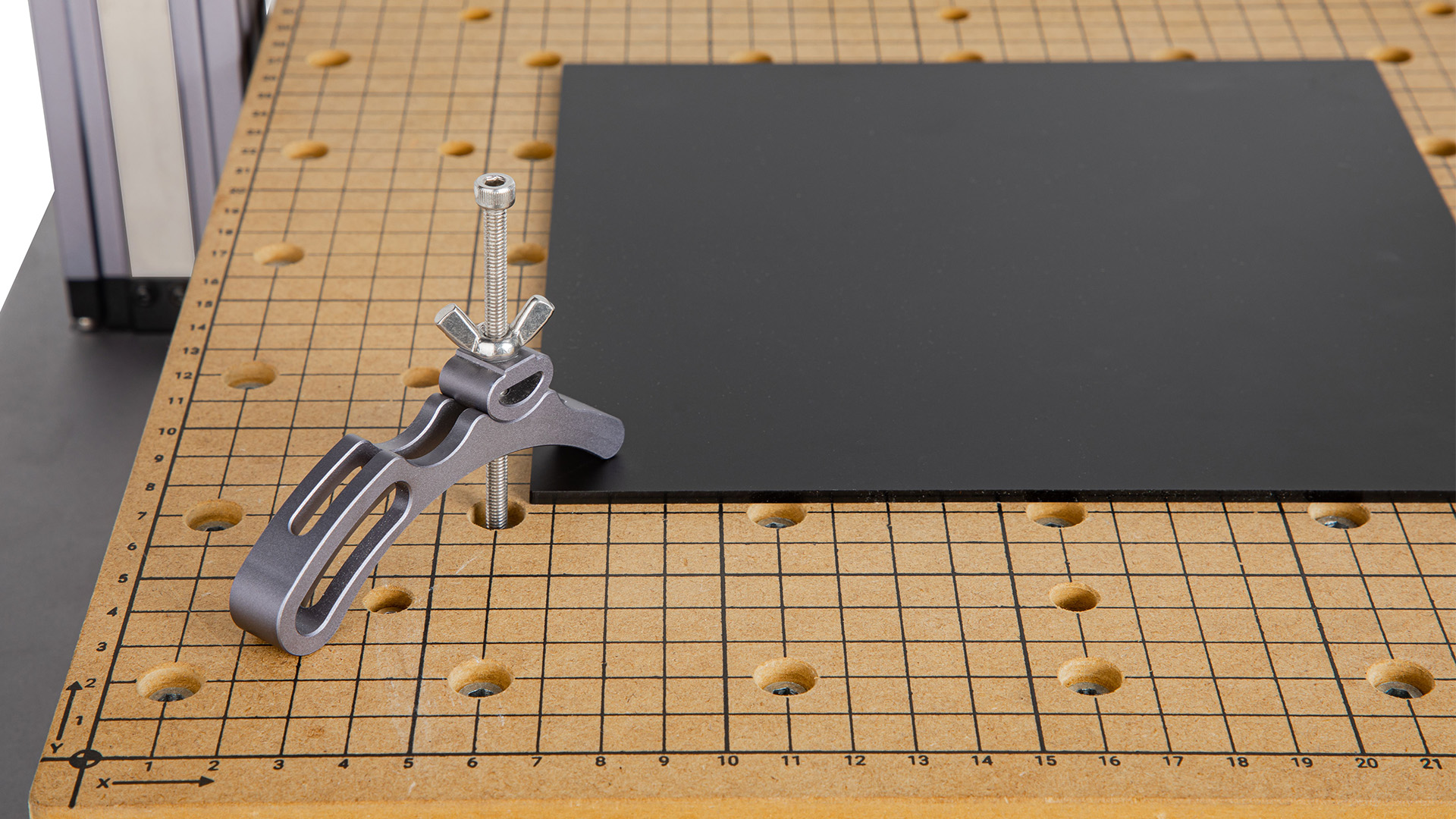 Attaching the fixture to the CNC platform.