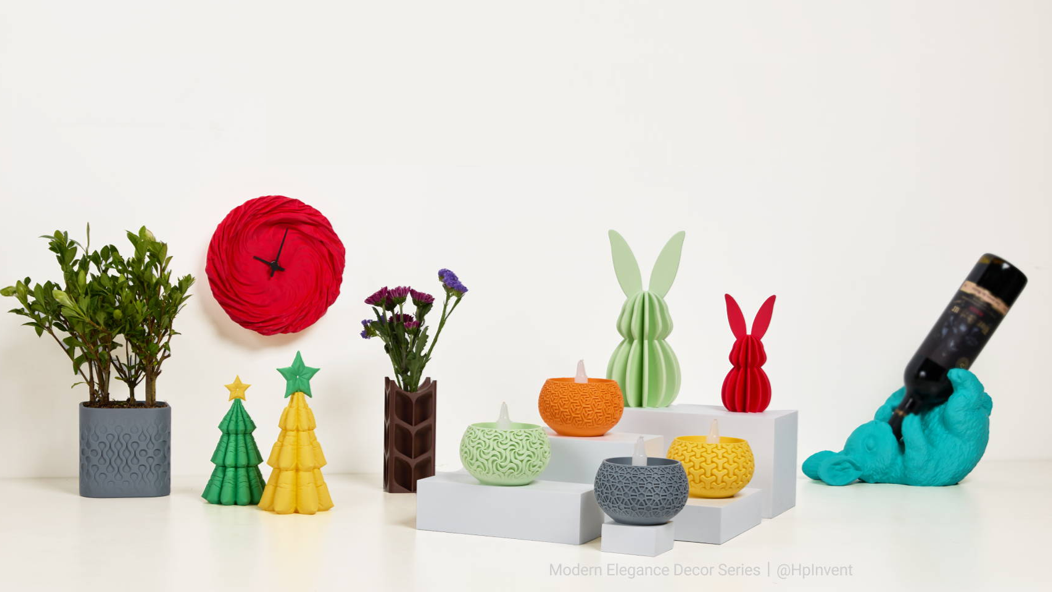A colorful display of intricately 3D-printed home decorations, including vases, bunnies, and candle holders