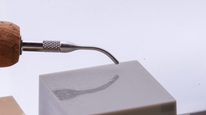 A metal deburring tool, a must-have accessory for refining edges on finished 3D prints.