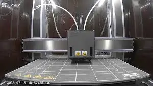 Live view from a chamber-mounted 3D printer camera, showing the entire build plate during a print job.