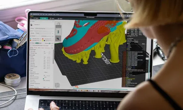 3D printing slicer preview showing 45-degree overhang support structures to prevent print failure.