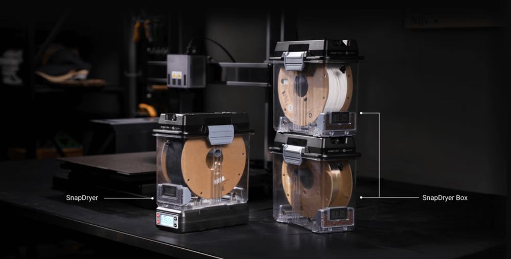 Snapmaker SnapDryer and stackable SnapDryer Box with 3D printing filament spools, filament drying storage boxes for Silk PLA moisture removal, prevents bubbling and stringing.