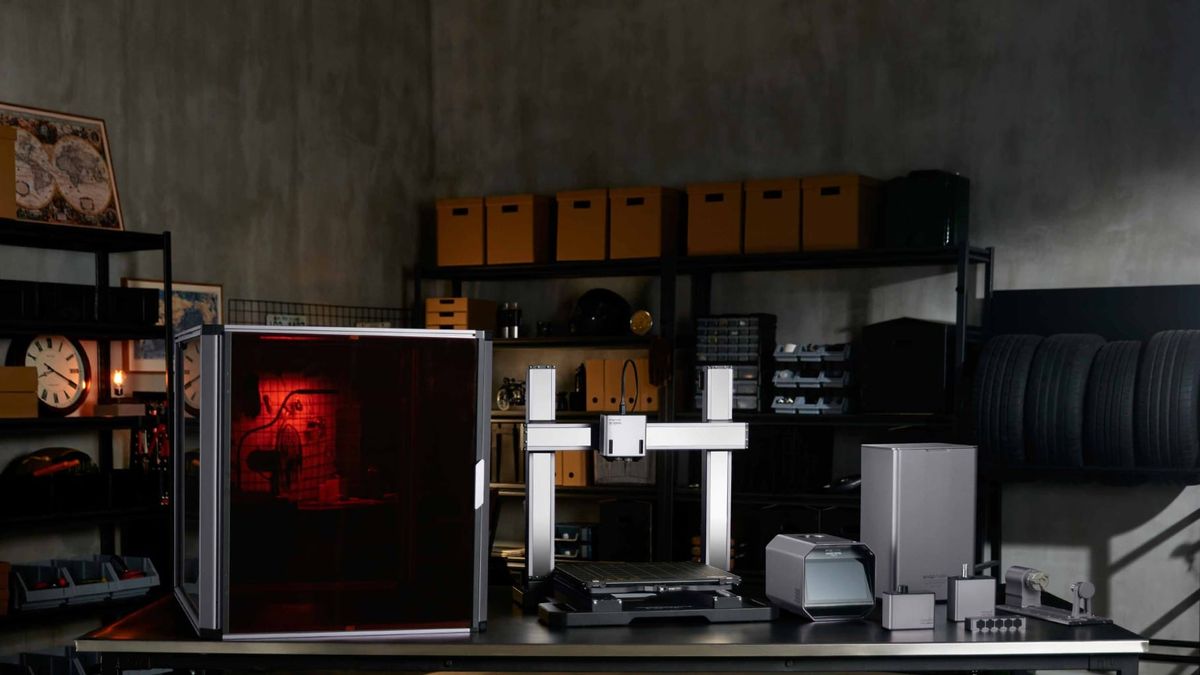 A neat 3D printer studio featuring a 3D printer and its accessories and modules.