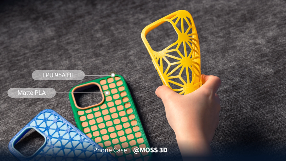 A hand bends a yellow 3D-printed phone case, demonstrating the flexibility and durability of TPU 95A HF filament alongside a dual-material green case.