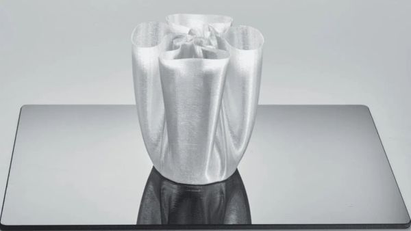3D printed clear PETG art vase demonstrating high transparency finish.