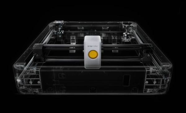 X-ray view of the Snapmaker U1 CoreXY 3D printer mechanism, showing stationary motors and linear rails for high-speed, precise printing.