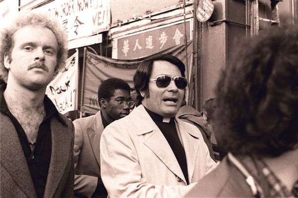 Black and white photograph of Jim Jones in San Francisco Chinatown 