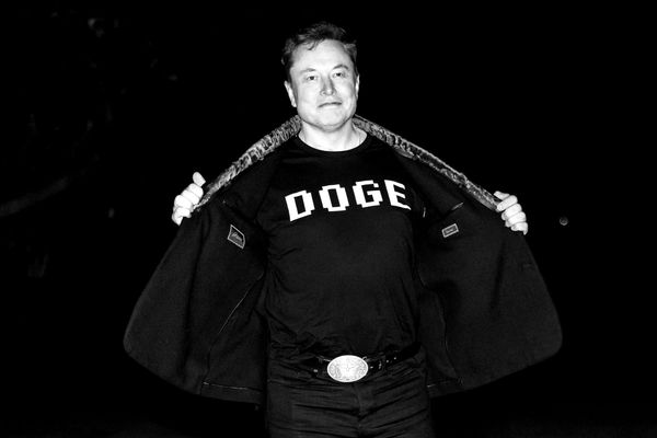 photo of elon musk in doge t-shirt