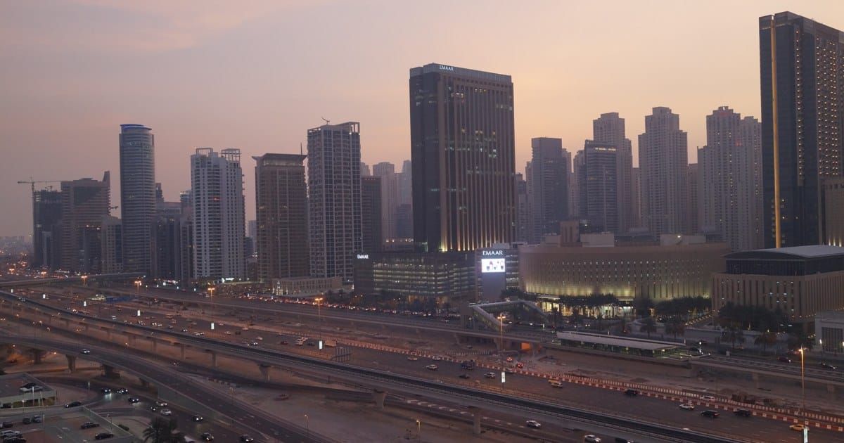 Dusk view from a tower in Jumeirah Lakes Towers, home of DMCC, over Dubai Marina and Sheikh Zayed Road.