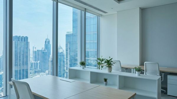 A minimalist modern Dubai office interior with a skyline view in cool daylight, representing a Swedish founder setting up a D